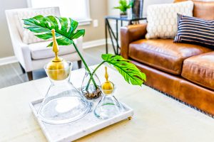 serving tray stand with empty glasses and plant in staging model